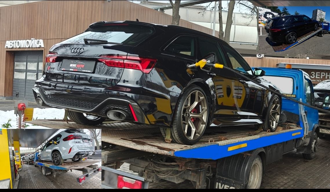Два эвакуатора перевозят автомобили BMW